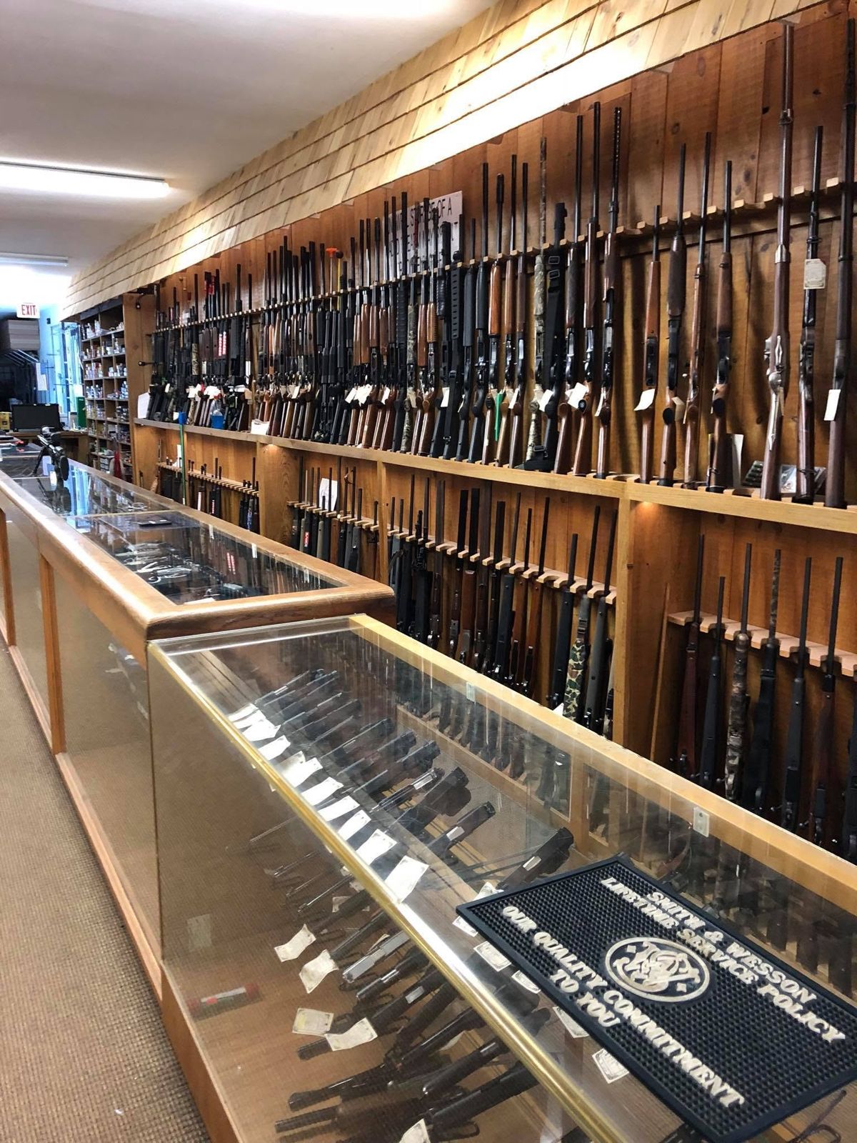Long gun wall above the handgun counters
