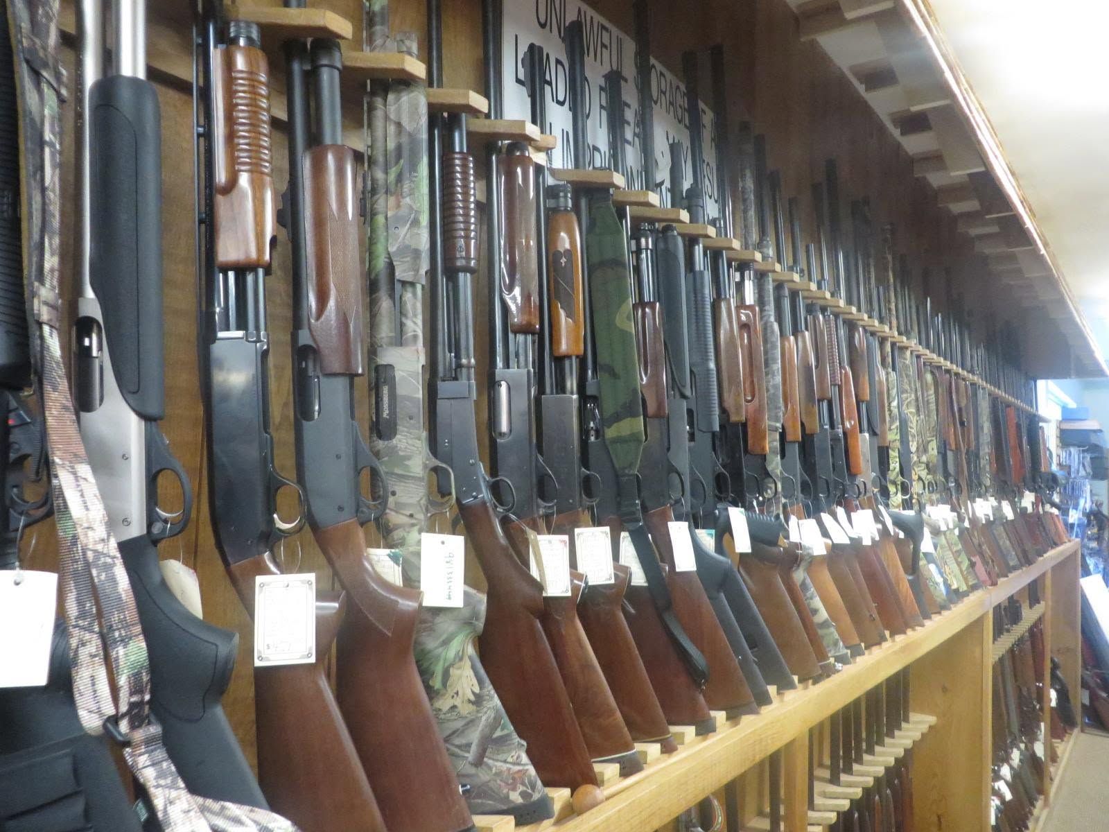 Shotguns and hunting rifles on the long gun rack
